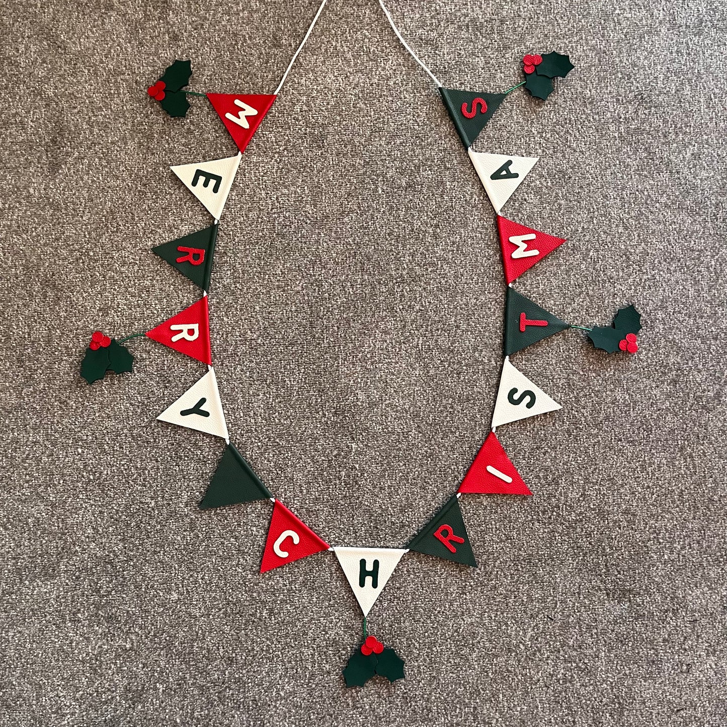 Merry Christmas Bunting With Hanging Holly