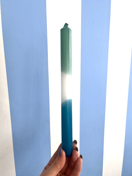 Taper candle in hues of green and blue