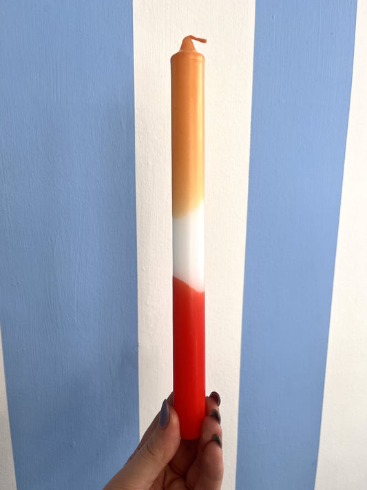 Taper candle in hues of orange